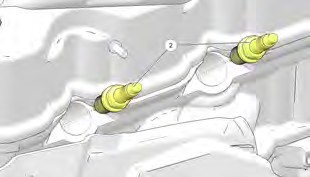 A close-up of a car engine

Description automatically generated