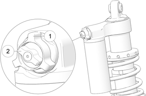 A drawing of a car suspension

Description automatically generated